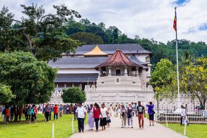 People visiting the Temple of the Sacred Tooth Relic (Temple of the Tooth, Sri Dalada Maligawa) in Kandy, Sri Lanka, Asia. This is a photo of people visiting the Temple of the Sacred Tooth Relic (Temple of the Tooth, Sri Dalada Maligawa) in Kandy, Sri Lanka, Asia.